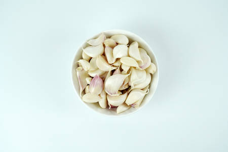 Fresh garlic, Delicious garlic isolated on color backgroundの写真素材