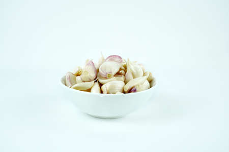 Fresh garlic, Delicious garlic isolated on color backgroundの写真素材