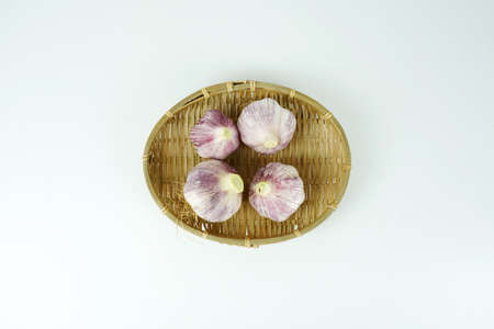 Fresh garlic, Delicious garlic isolated on color backgroundの写真素材