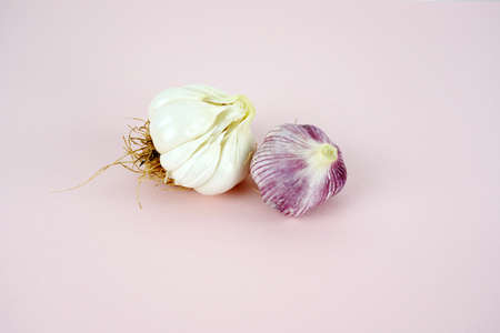 Fresh garlic, Delicious garlic isolated on color backgroundの写真素材