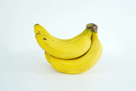 Fresh banana, Delicious banana isolated on color backgroundの写真素材