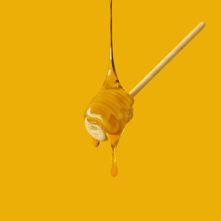 3D rendering Honey Drip and Honeycomb Background.の写真素材