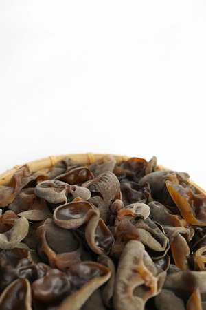 Fresh wood ear nushroom on white background,raw material for cooking. Close up.の写真素材