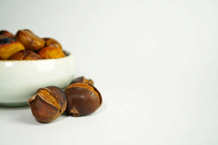 roasted chestnuts on a white background, winterの写真素材