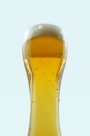 Full beer glass, A glass of cold beer macro photography, cool beer objectの写真素材