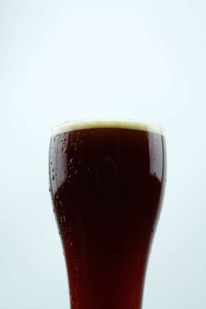 Full beer glass, A glass of cold beer macro photography, cool beer objectの写真素材