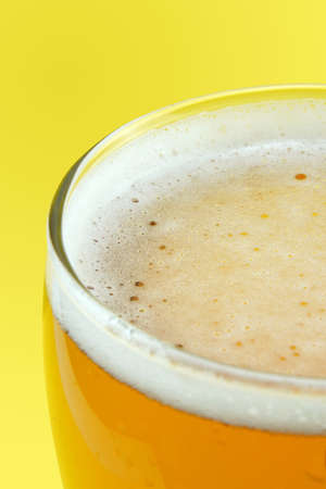 Full beer glass, A glass of cold beer macro photography, cool beer objectの写真素材