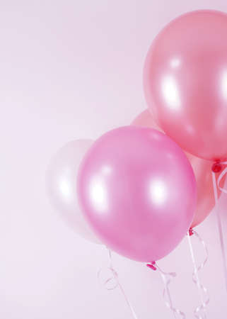 Colorful balloons background, Many blown balloons on wall,Bunch of balloons isolated on backgroundの写真素材