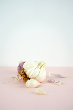 Fresh garlic, Delicious garlic isolated on color backgroundの写真素材