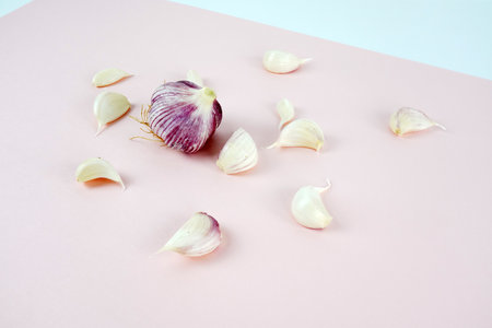 Fresh garlic, Delicious garlic isolated on color backgroundの写真素材