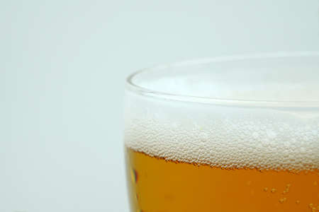 Full beer glass, A glass of cold beer macro photography, cool beer objectの写真素材