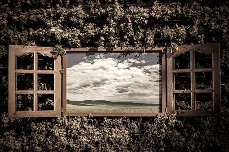 Open window from old room with landscape on a background