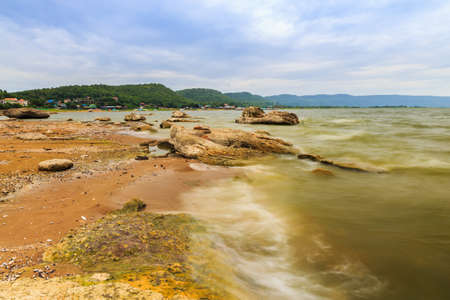 Small waves hit lightly the shore