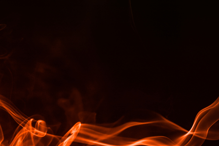 colorful smoke on dark backgroundの写真素材