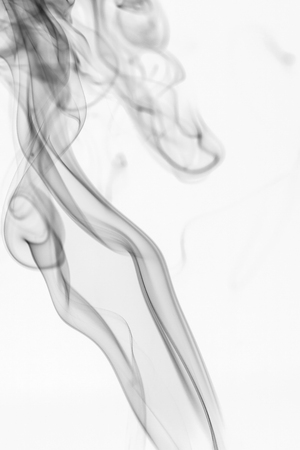 colorful smoke on dark backgroundの写真素材