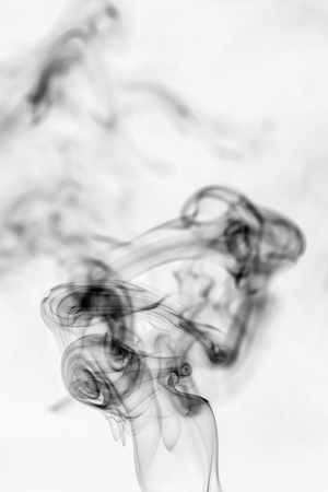 colorful smoke on dark backgroundの写真素材