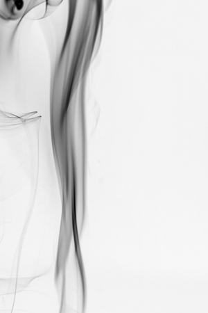 colorful smoke on dark backgroundの写真素材