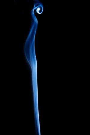 colorful smoke on dark backgroundの写真素材