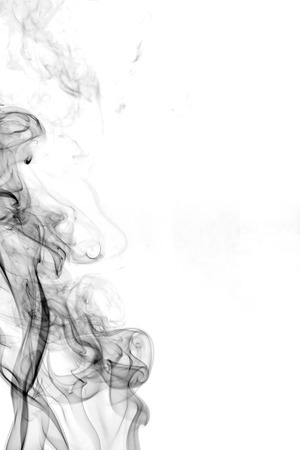 colorful smoke on dark backgroundの写真素材