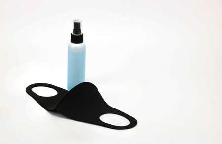 alcohol spray, Black elastic Mask Protect from virus  on white background , isolatedの写真素材