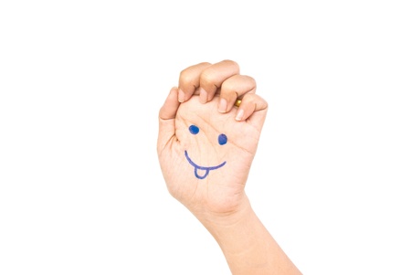 Smile on the hand for happy concept.の写真素材