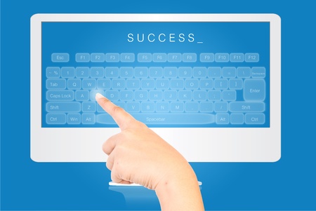 Hand pressing keyboard on the monitor screen isolate on the white.の写真素材