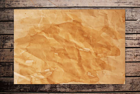 Vintage paper on the classic wood texture background.の写真素材