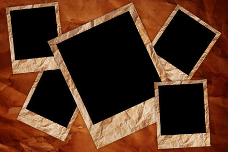 Vintage photo frame on the vintage paper texture background.の写真素材