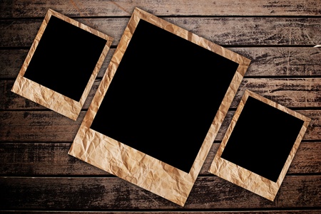 Vintage photo frame on the wood texture background.の写真素材