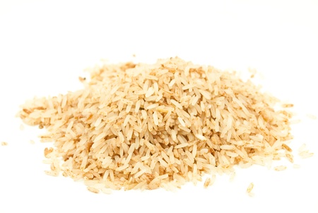 Brown rice isolated on the white.の写真素材