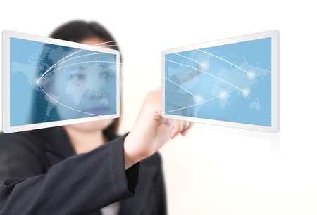 Asian lady pushing social network on tablet screen.