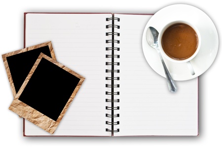 Coffee cup on the notebook.の写真素材