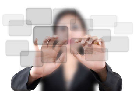 Asian business lady pushing button on the whiteboard.の写真素材