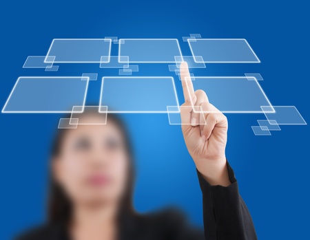 Asian business lady pushing button on the whiteboard.の写真素材