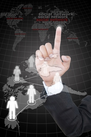 Business hand pushing people social network.の写真素材