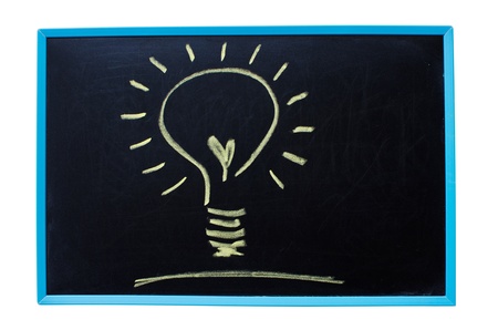 Light bulb as idea concept on the blackboard.