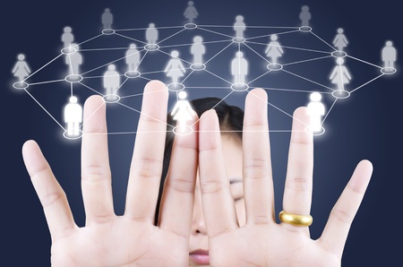 Lady finger pushing Social Network.の写真素材