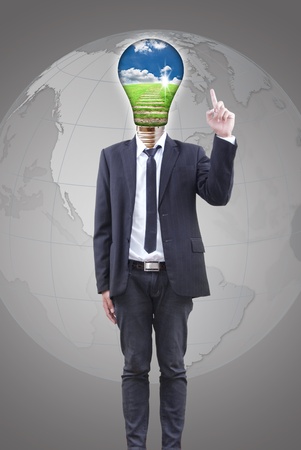 Businessman with light bulb concept.の写真素材