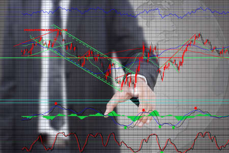 Businessman pushing finance graph for trade stock market on the whiteboard.の写真素材