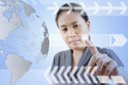 Business lady pushing digital button on touch screen interface の写真素材