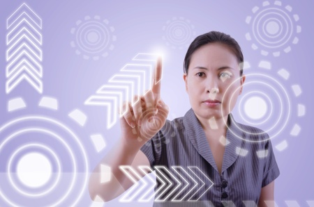 Business lady pushing digital button on touch screen interface 