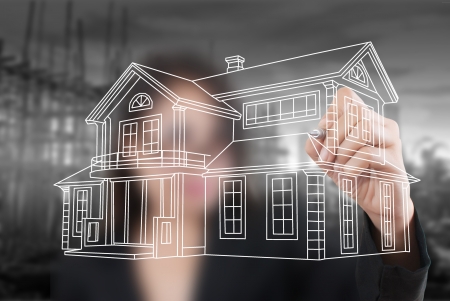 Business lady drawing house plan for construction on the whiteboard の写真素材