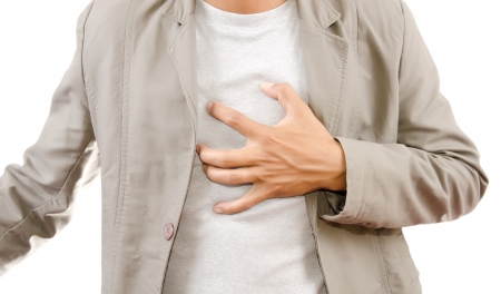 Businessman Suffering From Heart Attack の写真素材