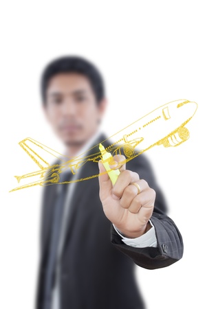 Businessman Drawing Airplane for travel around the world の写真素材
