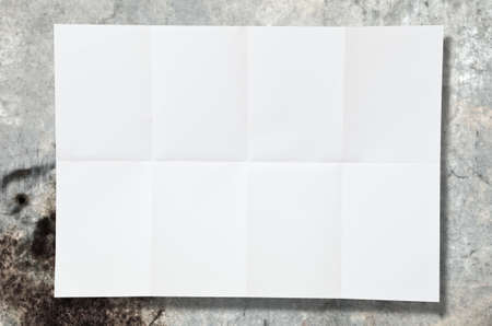 Blank white paper on the wall の写真素材