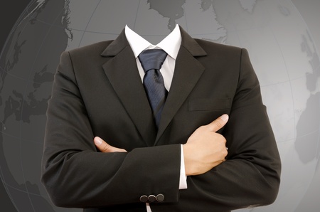 Successful Businessman with Crossed Hands with globe の写真素材