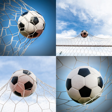 Soccer football in Goal netの写真素材