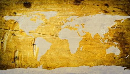 World map carving on wood plank.の写真素材