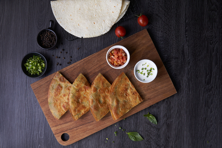 quesadilla pack with bacon and sauce
