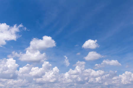 blue sky background with white cloudsの写真素材